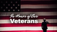 In honor of our Veterans text in front of a U.S. Flag with the Silhouette of a soldier.